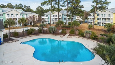 This is a rare opportunity to own this 1st floor 2 BR/2BA end on Brunswick Plantation and Golf Resorts in North Carolina - for sale on GolfHomes.com, golf home, golf lot