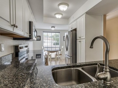 Escape the cold and enjoy easy, carefree Florida living in this on The Meadows Golf and Country Club in Florida - for sale on GolfHomes.com, golf home, golf lot