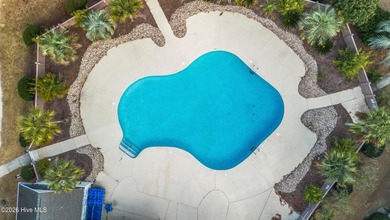 This is a rare opportunity to own this 1st floor 2 BR/2BA end on Brunswick Plantation and Golf Resorts in North Carolina - for sale on GolfHomes.com, golf home, golf lot