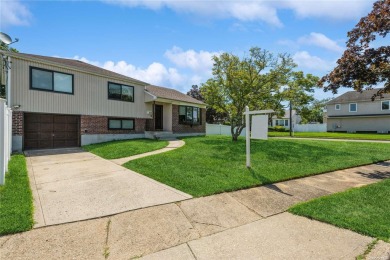 Beautiful Home in the Estates Section of Oceanside. Features: 3 on Middle Bay Country Club in New York - for sale on GolfHomes.com, golf home, golf lot