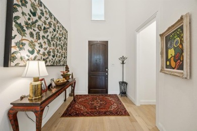 Discover refined living in this immaculate four-bedroom on Lantana Golf Club in Texas - for sale on GolfHomes.com, golf home, golf lot