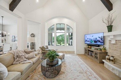 Discover refined living in this immaculate four-bedroom on Lantana Golf Club in Texas - for sale on GolfHomes.com, golf home, golf lot