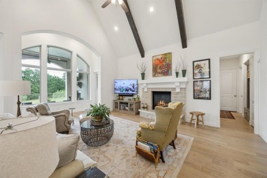Discover refined living in this immaculate four-bedroom on Lantana Golf Club in Texas - for sale on GolfHomes.com, golf home, golf lot