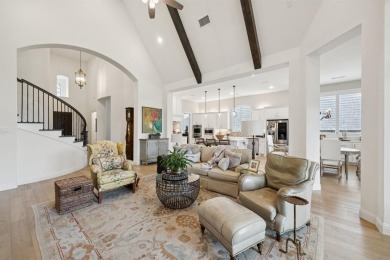 Discover refined living in this immaculate four-bedroom on Lantana Golf Club in Texas - for sale on GolfHomes.com, golf home, golf lot