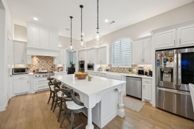 Discover refined living in this immaculate four-bedroom on Lantana Golf Club in Texas - for sale on GolfHomes.com, golf home, golf lot