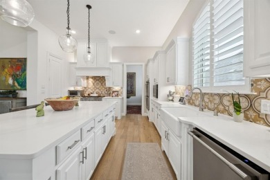 Discover refined living in this immaculate four-bedroom on Lantana Golf Club in Texas - for sale on GolfHomes.com, golf home, golf lot
