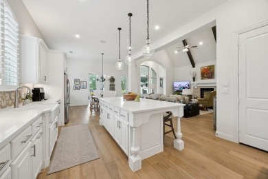 Discover refined living in this immaculate four-bedroom on Lantana Golf Club in Texas - for sale on GolfHomes.com, golf home, golf lot