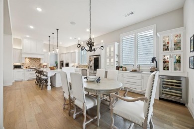Discover refined living in this immaculate four-bedroom on Lantana Golf Club in Texas - for sale on GolfHomes.com, golf home, golf lot