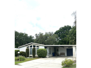 Nestled on a curve for added privacy, this beautifully upgraded on Schalamar Creek Golf and Country Club in Florida - for sale on GolfHomes.com, golf home, golf lot