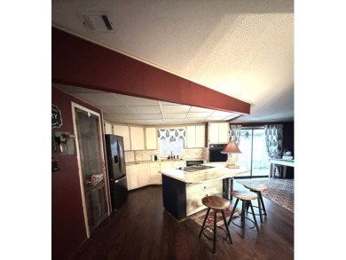 Nestled on a curve for added privacy, this beautifully upgraded on Schalamar Creek Golf and Country Club in Florida - for sale on GolfHomes.com, golf home, golf lot