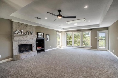 WOW! This home backs to a private creek, a huge deck that will on Eagle Mountain Country Club  in Texas - for sale on GolfHomes.com, golf home, golf lot
