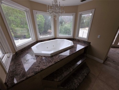 Once a showcase home, this property now represents a true heavy on Coto De Caza Golf Club in California - for sale on GolfHomes.com, golf home, golf lot