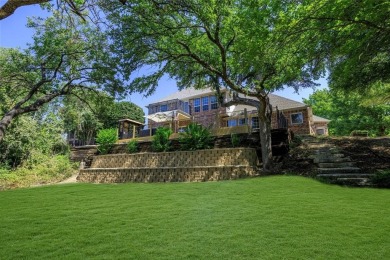 WOW! This home backs to a private creek, a huge deck that will on Eagle Mountain Country Club  in Texas - for sale on GolfHomes.com, golf home, golf lot