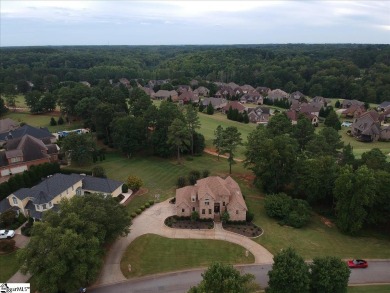 Experience luxurious living in the heart of Woodfin Ridge Golf on Woodfin Ridge Golf Club in South Carolina - for sale on GolfHomes.com, golf home, golf lot