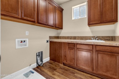 Beautiful 5-bedroom, 3-bathroom home perfectly positioned with on The Resort At Red Hawk  in Nevada - for sale on GolfHomes.com, golf home, golf lot