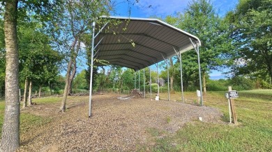 Enjoy the best of lake living on two beautifully treed lots on Links At Lands End in Texas - for sale on GolfHomes.com, golf home, golf lot