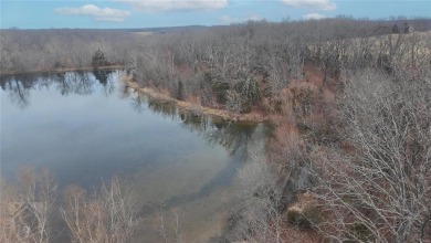 Looking to build a home with lake views?  Then look no further! on Oak Hills Country Club in Missouri - for sale on GolfHomes.com, golf home, golf lot