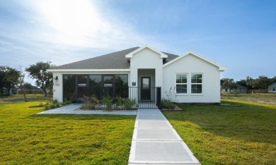 The Midland plan is a two-story, 4-bedroom, 3-bathroom home on Rockport Country Club in Texas - for sale on GolfHomes.com, golf home, golf lot