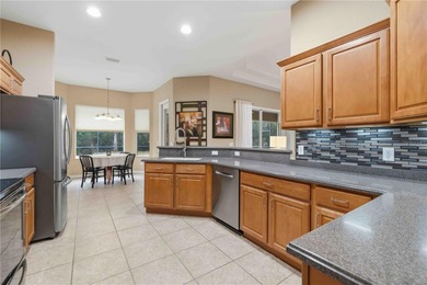 Welcome to this Beautifully Appointed Pool home in Gated on Stoneybrook Golf Club At Heritage Harbour in Florida - for sale on GolfHomes.com, golf home, golf lot