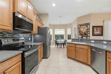 Welcome to this Beautifully Appointed Pool home in Gated on Stoneybrook Golf Club At Heritage Harbour in Florida - for sale on GolfHomes.com, golf home, golf lot