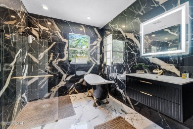 Stunning home in the exclusive community of LPGA International on LPGA International Golf Course in Florida - for sale on GolfHomes.com, golf home, golf lot