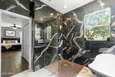 Stunning home in the exclusive community of LPGA International on LPGA International Golf Course in Florida - for sale on GolfHomes.com, golf home, golf lot