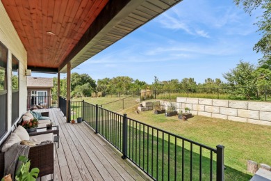Welcome home to this beautiful 4 bedroom, 3 bath ranch retreat on Toad Valley Public Golf Course in Iowa - for sale on GolfHomes.com, golf home, golf lot
