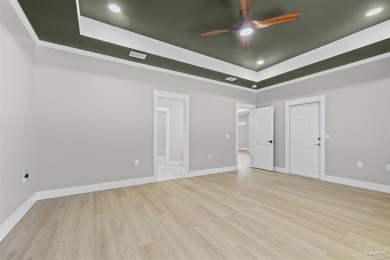 Beautifully updated home on the 13th tee of Tiger Point Golf on Tiger Point Golf and Country Club in Florida - for sale on GolfHomes.com, golf home, golf lot