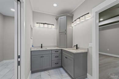 Beautifully updated home on the 13th tee of Tiger Point Golf on Tiger Point Golf and Country Club in Florida - for sale on GolfHomes.com, golf home, golf lot