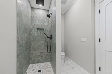 Beautifully updated home on the 13th tee of Tiger Point Golf on Tiger Point Golf and Country Club in Florida - for sale on GolfHomes.com, golf home, golf lot