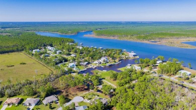 Embrace coastal living just minutes from the beach! This vacant on Orange Beach Golf Center in Alabama - for sale on GolfHomes.com, golf home, golf lot