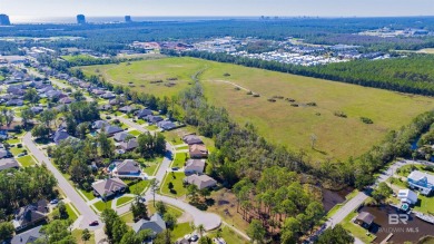 Embrace coastal living just minutes from the beach! This vacant on Orange Beach Golf Center in Alabama - for sale on GolfHomes.com, golf home, golf lot