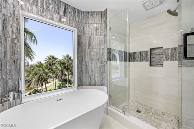 SPECTACULAR CUSTOM DESIGNED REMODEL! Stunning Gulf and Garden on Fort Myers Beach and Golf Club in Florida - for sale on GolfHomes.com, golf home, golf lot