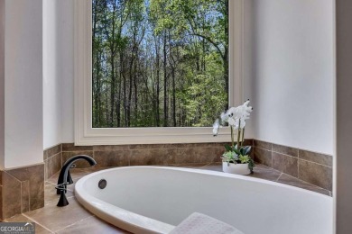 Listed below appraisal and seller is motivated - send your on Hawks Ridge Golf Club in Georgia - for sale on GolfHomes.com, golf home, golf lot
