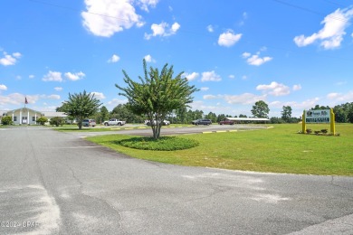 Less than a quarter of a mile off of Hwy 77 and less than a half on Sunny Hills Golf and Country Club in Florida - for sale on GolfHomes.com, golf home, golf lot