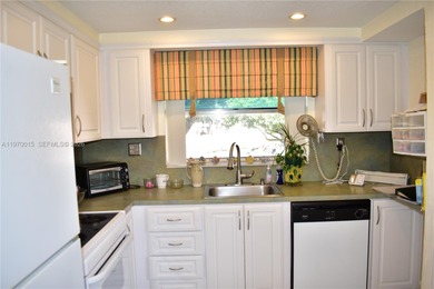 Very bright, clean and spacious 2/2 corner overlooking 2 pools on  in Florida - for sale on GolfHomes.com, golf home, golf lot