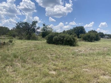 This large corner lot offers the best of both worlds: a tranquil on Slick Rock Golf Course - Horseshoe Bay in Texas - for sale on GolfHomes.com, golf home, golf lot