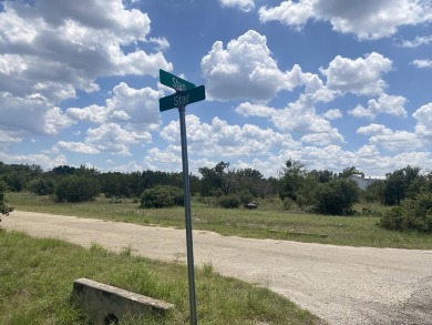 This large corner lot offers the best of both worlds: a tranquil on Slick Rock Golf Course - Horseshoe Bay in Texas - for sale on GolfHomes.com, golf home, golf lot
