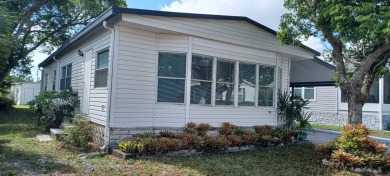 Come settle down in comfort and relaxation in an updated on Fairways Country Club in Florida - for sale on GolfHomes.com, golf home, golf lot