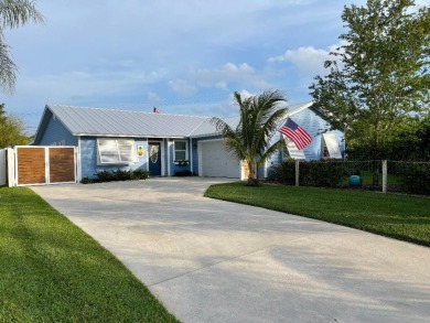 Renovated pool home on large, fully fenced lot in desirable on Miles Grant Country Club in Florida - for sale on GolfHomes.com, golf home, golf lot
