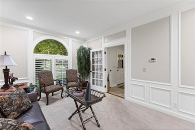 Discover a distinguished Tudor-style home by builder Jim Lambie on Leawood South Country Club in Kansas - for sale on GolfHomes.com, golf home, golf lot