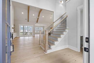 Stunning new construction in Harbor Club featuring the luxury on Harbor Club Golf and Country Club in Georgia - for sale on GolfHomes.com, golf home, golf lot