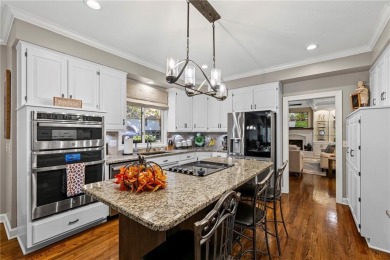 Discover a distinguished Tudor-style home by builder Jim Lambie on Leawood South Country Club in Kansas - for sale on GolfHomes.com, golf home, golf lot