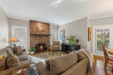 Discover a distinguished Tudor-style home by builder Jim Lambie on Leawood South Country Club in Kansas - for sale on GolfHomes.com, golf home, golf lot