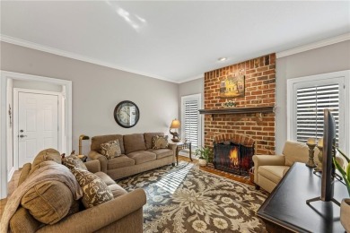 Discover a distinguished Tudor-style home by builder Jim Lambie on Leawood South Country Club in Kansas - for sale on GolfHomes.com, golf home, golf lot