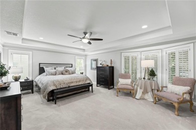 Discover a distinguished Tudor-style home by builder Jim Lambie on Leawood South Country Club in Kansas - for sale on GolfHomes.com, golf home, golf lot