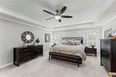 Discover a distinguished Tudor-style home by builder Jim Lambie on Leawood South Country Club in Kansas - for sale on GolfHomes.com, golf home, golf lot