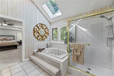 Discover a distinguished Tudor-style home by builder Jim Lambie on Leawood South Country Club in Kansas - for sale on GolfHomes.com, golf home, golf lot