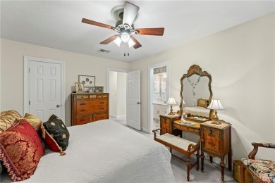 Discover a distinguished Tudor-style home by builder Jim Lambie on Leawood South Country Club in Kansas - for sale on GolfHomes.com, golf home, golf lot