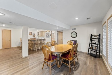 Discover a distinguished Tudor-style home by builder Jim Lambie on Leawood South Country Club in Kansas - for sale on GolfHomes.com, golf home, golf lot